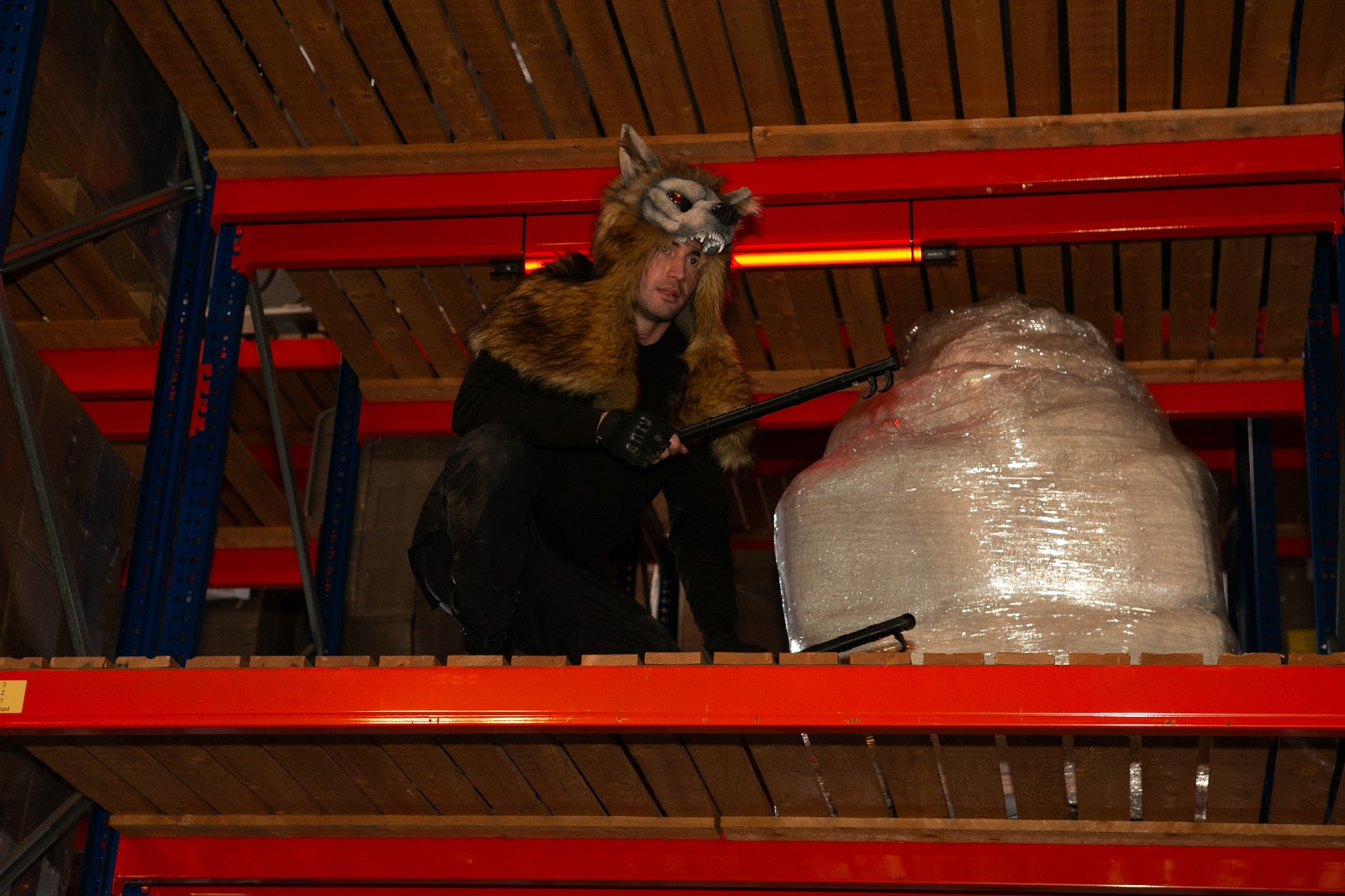 Performer in costume on the Moon Claw set.